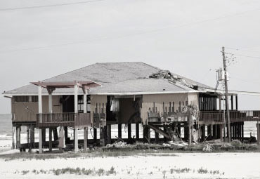 Wind damage - spray foam can help prevent uplift to Charleston roofs